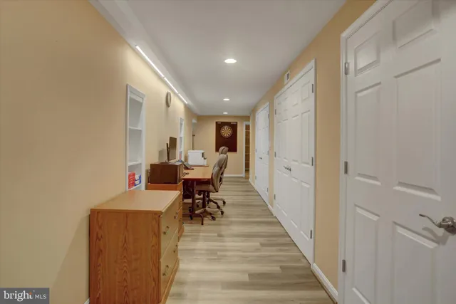 a room with pool table table tennis pool table and windows