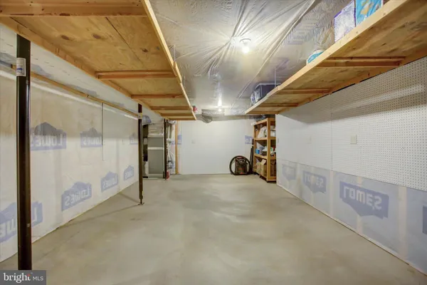 a bathroom with a toilet and a sink