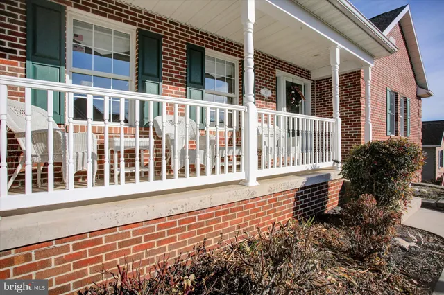 a view of a house with a small yard