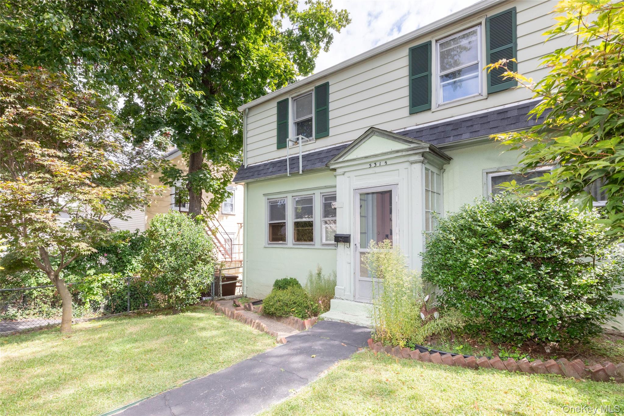 531 1/2 Willett Avenue Port Chester, NY 10573 - Photo 1 of 31 a front view of a house with a yard