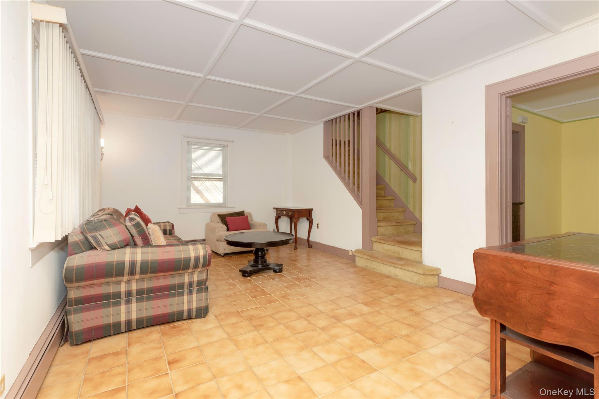 531 1/2 Willett Avenue Port Chester, NY 10573 - Photo 5 of 31 a living room with furniture and a window