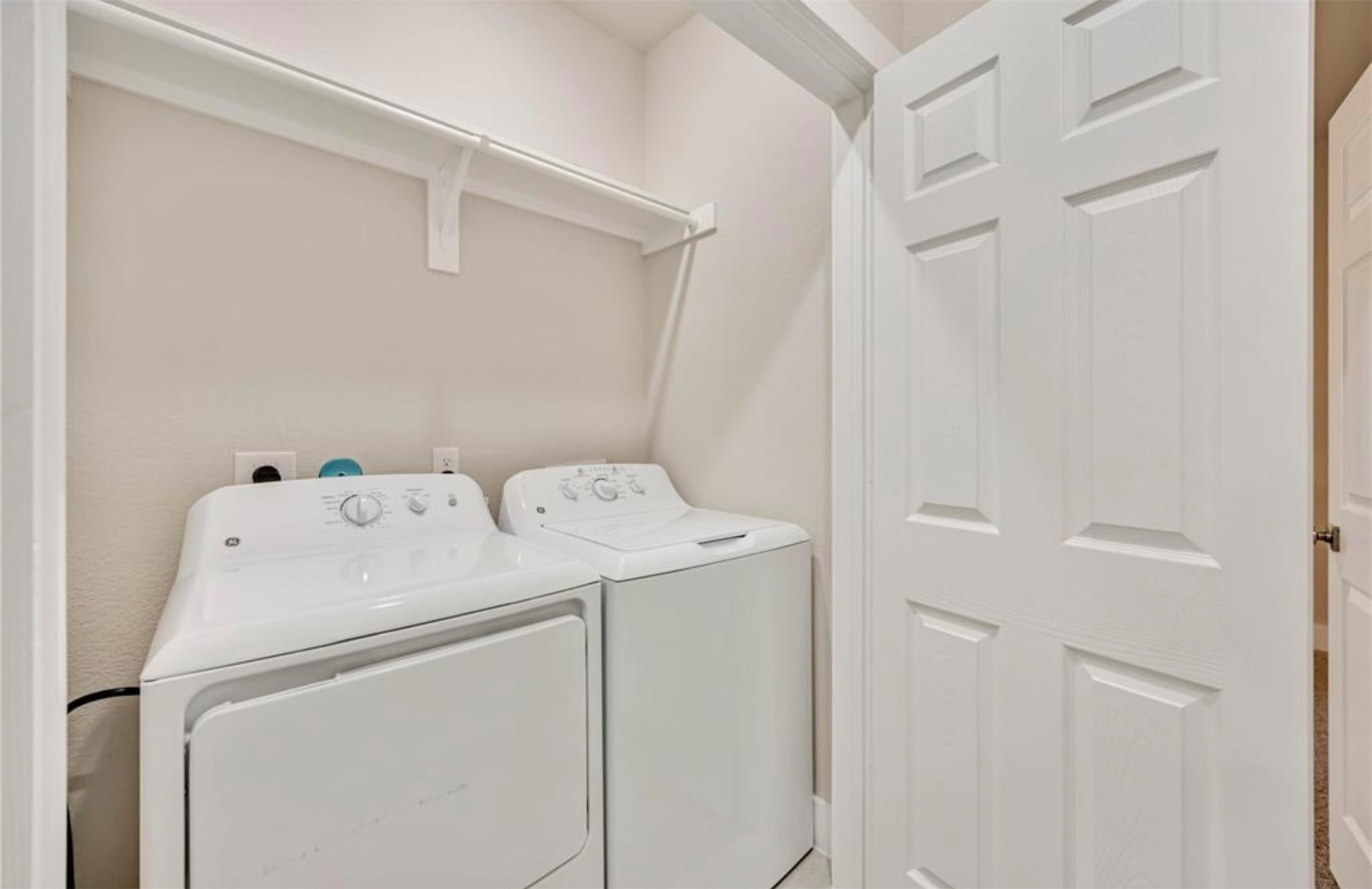 415 Gans Street, Unit AB Houston, TX 77029 - Photo 13 of 24 a utility room with dryer and washer