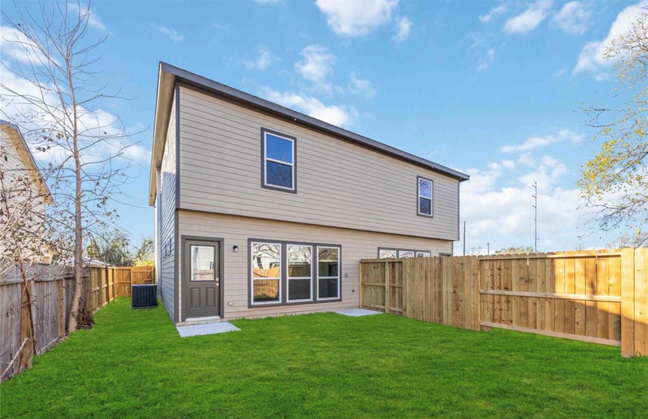 415 Gans Street, Unit AB Houston, TX 77029 - Photo 24 of 24 a view of a house with a yard and sitting area