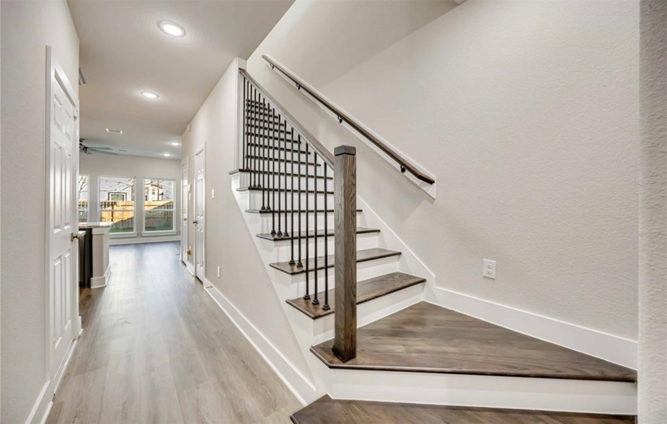 415 Gans Street, Unit AB Houston, TX 77029 - Photo 4 of 24 a view of entryway and hall with wooden floor