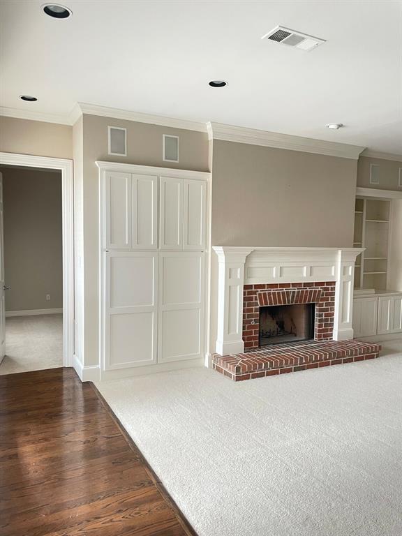 2605 Tulip Drive Richardson, TX 75082 - Photo 12 of 30 an entryway and livingroom with fireplace