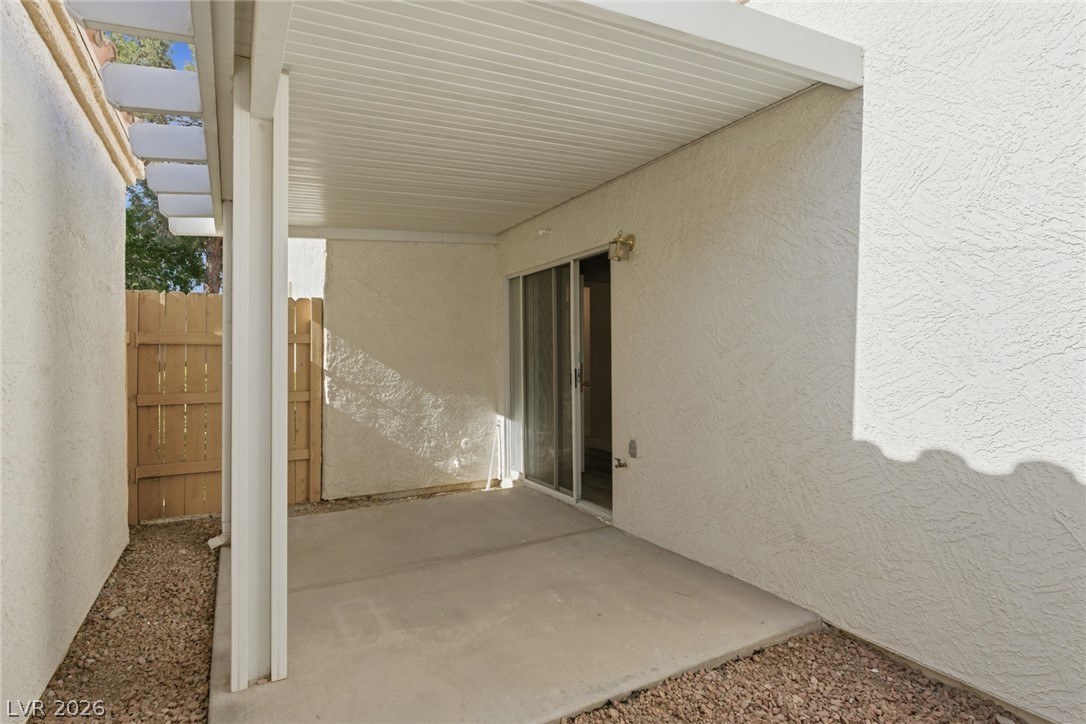 5449 Bugle Way, Unit 104 Las Vegas, NV 89108 - Photo 30 of 33 patio 2- This private outdoor space offers a covered patio and direct access indoors.