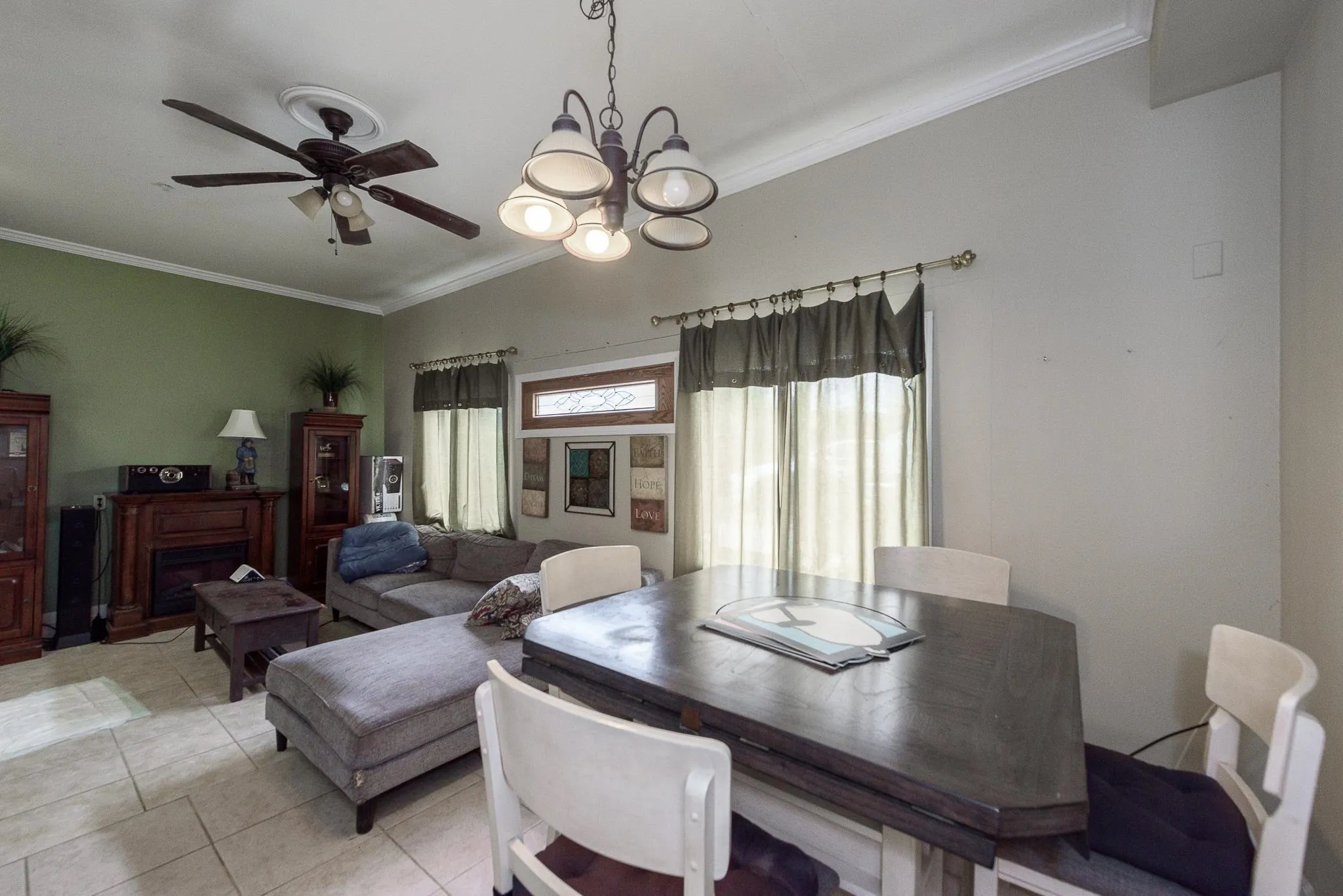 16021 Pomerado Road Poway, CA 92064 - Photo 7 of 15 a view of a dining room with furniture window and wooden floor