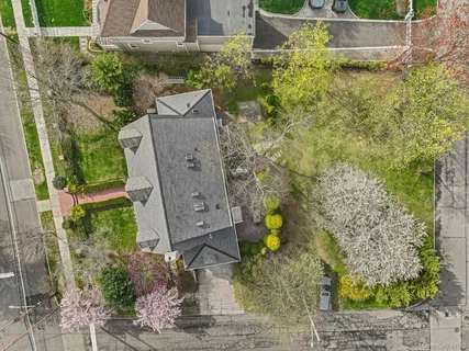 a aerial view of a house with a yard
