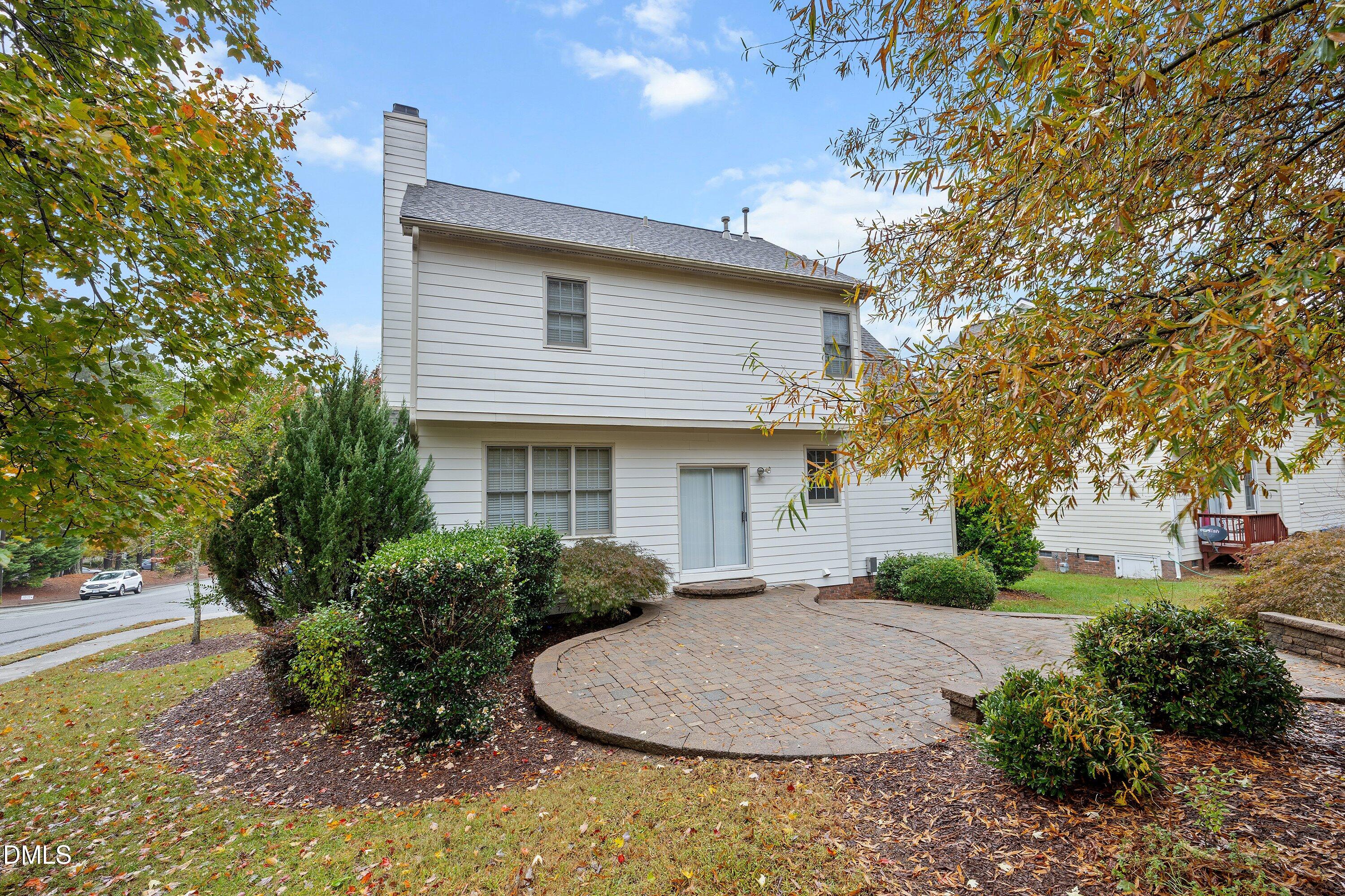 102 College Avenue Durham, NC 27713 - Photo 30 of 38 a front view of a house with a garden