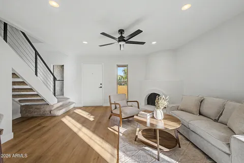 a view of a livingroom with furniture and a table