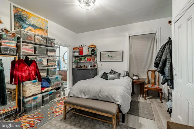 a bedroom with furniture and a bed