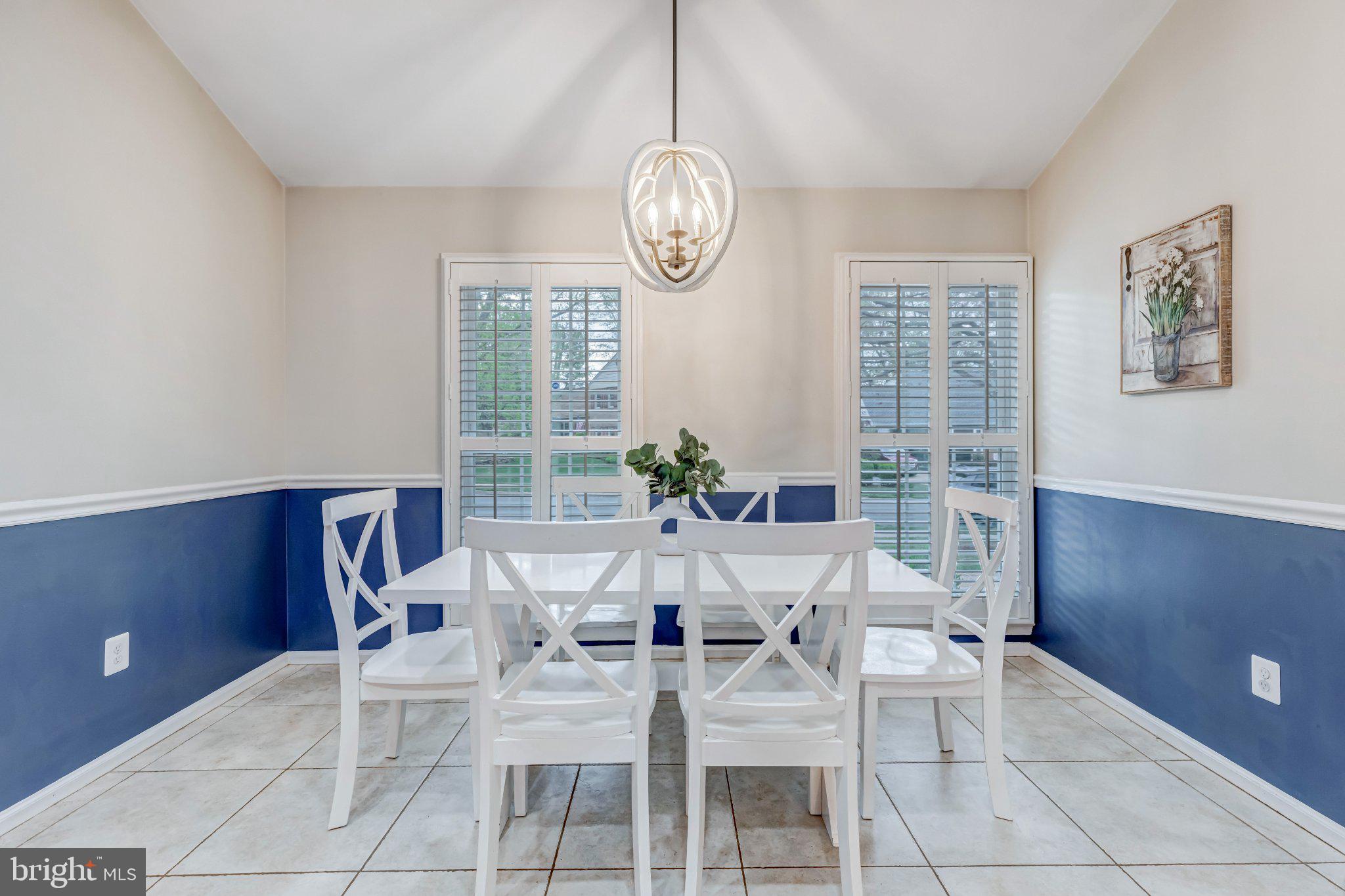 8619 Nanlee Drive Springfield, VA 22152 - Photo 13 of 73 a view of a dining room with furniture