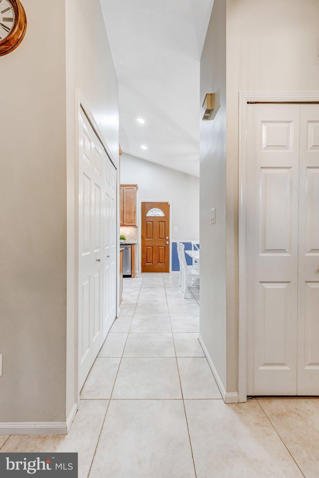8619 Nanlee Drive Springfield, VA 22152 - Photo 15 of 73 a view of a hallway with a kitchen