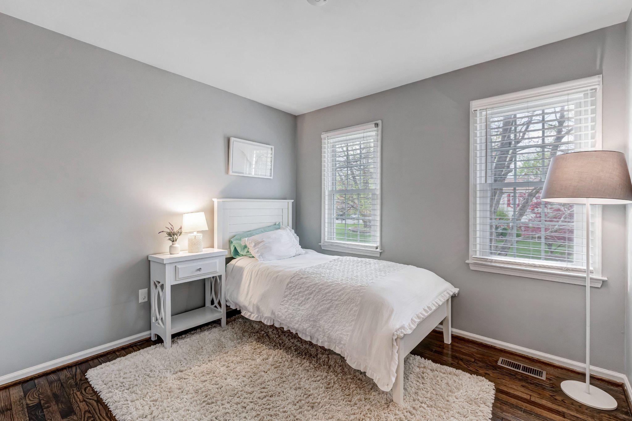 8619 Nanlee Drive Springfield, VA 22152 - Photo 18 of 73 a bedroom with a bed and a window