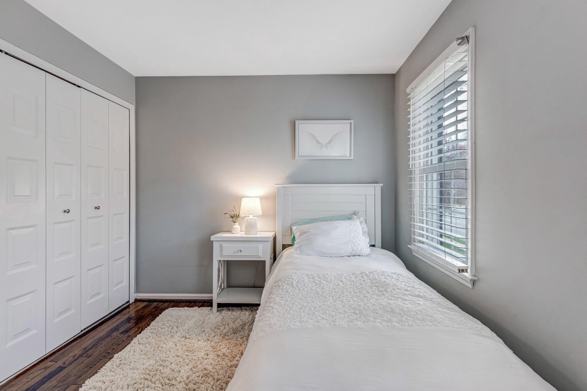 8619 Nanlee Drive Springfield, VA 22152 - Photo 19 of 73 a bed room with a bed and a window