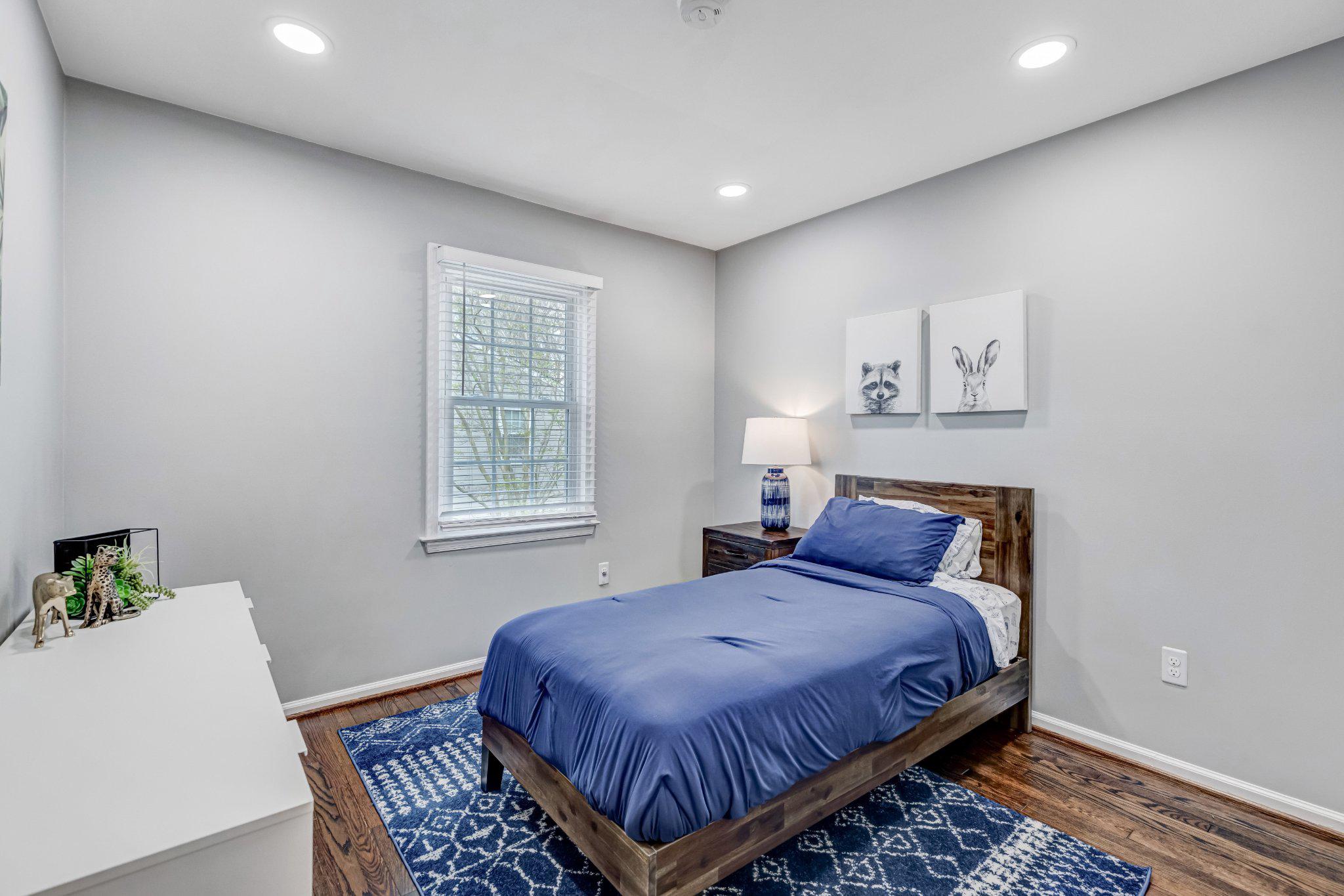 8619 Nanlee Drive Springfield, VA 22152 - Photo 24 of 73 a bedroom with a bed and a window