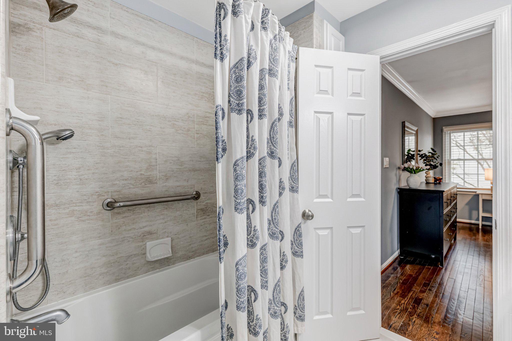 8619 Nanlee Drive Springfield, VA 22152 - Photo 31 of 73 a bathroom with a shower