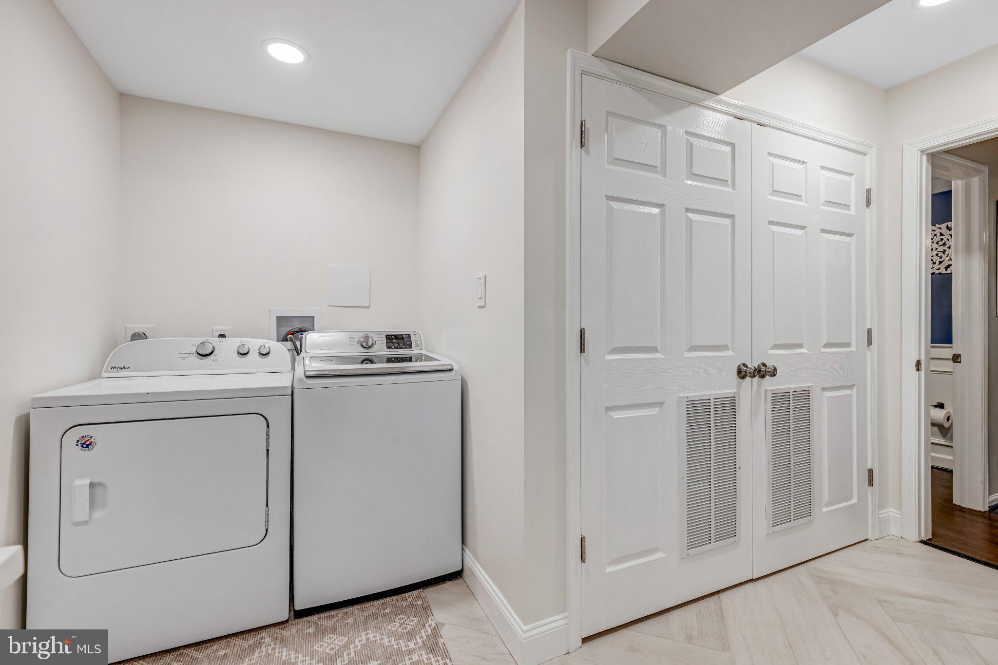 8619 Nanlee Drive Springfield, VA 22152 - Photo 45 of 73 a utility room with dryer and washer