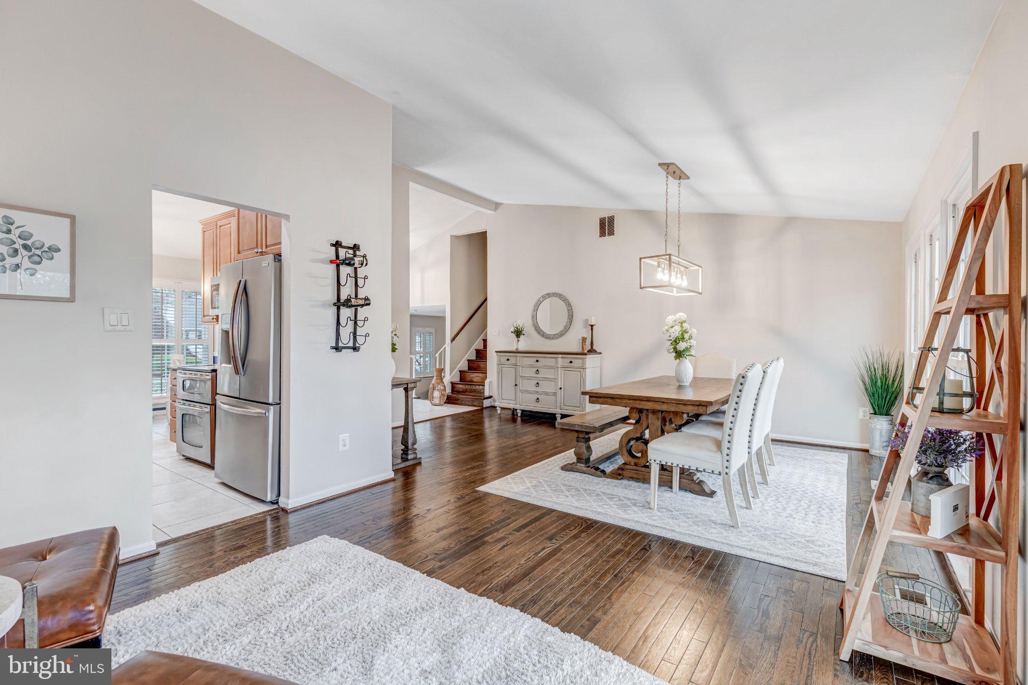 8619 Nanlee Drive Springfield, VA 22152 - Photo 5 of 73 a living room with furniture and a wooden floor