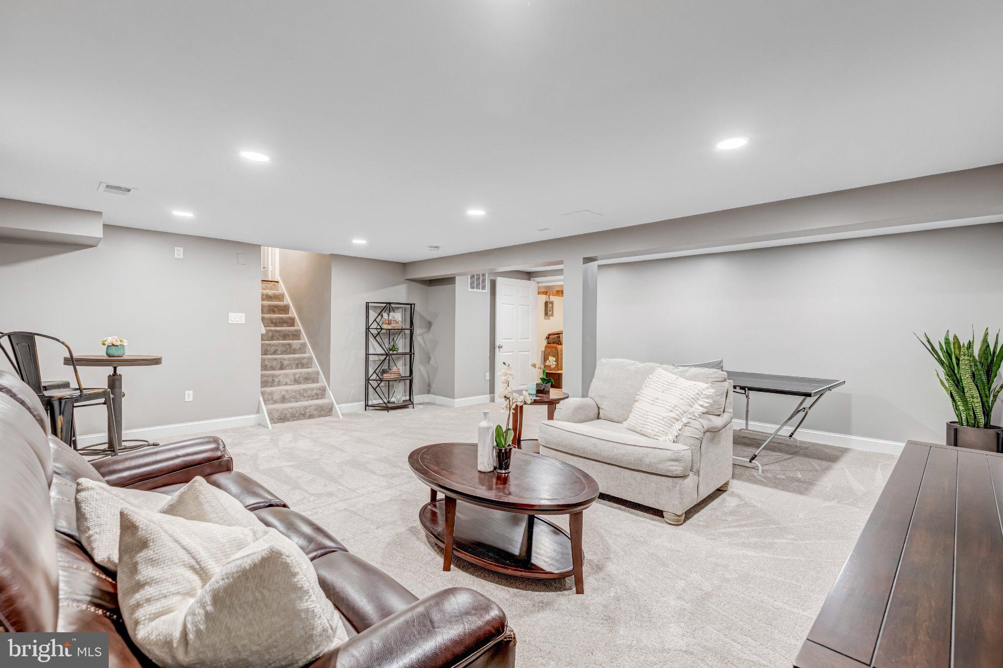 8619 Nanlee Drive Springfield, VA 22152 - Photo 51 of 73 a living room with furniture and white walls