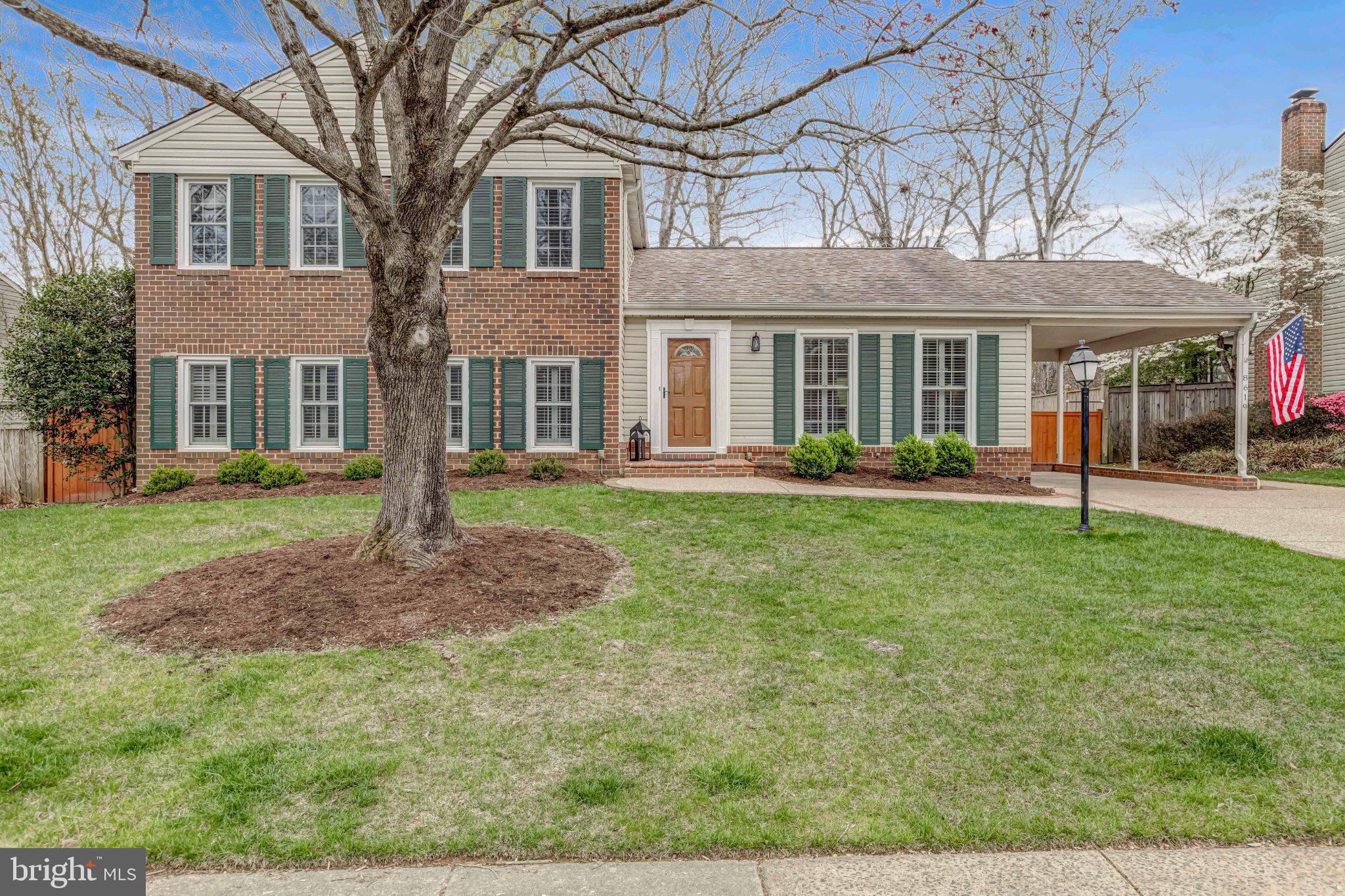 8619 Nanlee Drive Springfield, VA 22152 - Photo 59 of 73 Charming brick home with lush greenery.