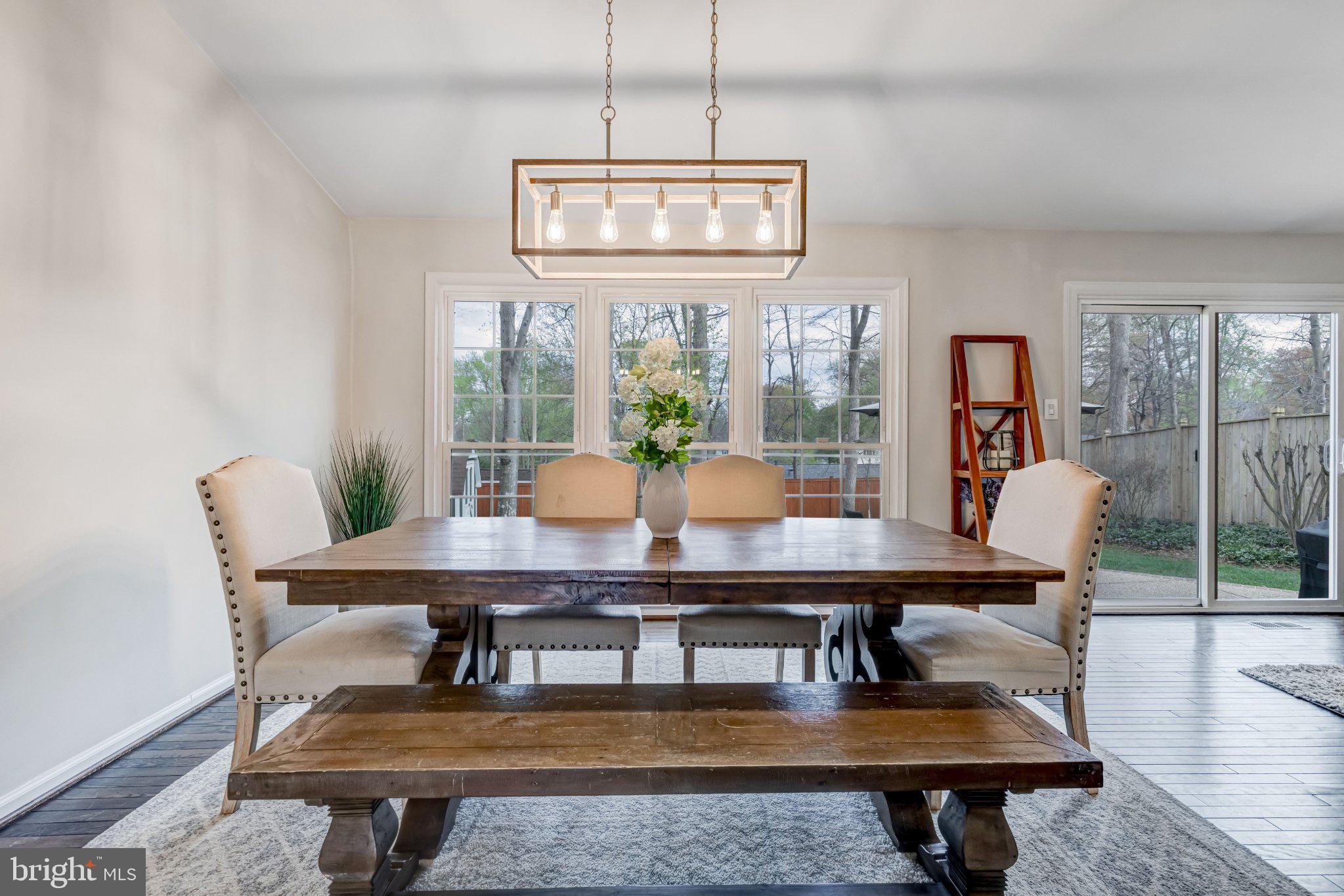8619 Nanlee Drive Springfield, VA 22152 - Photo 6 of 73 a view of a dining room with furniture window and wooden floor