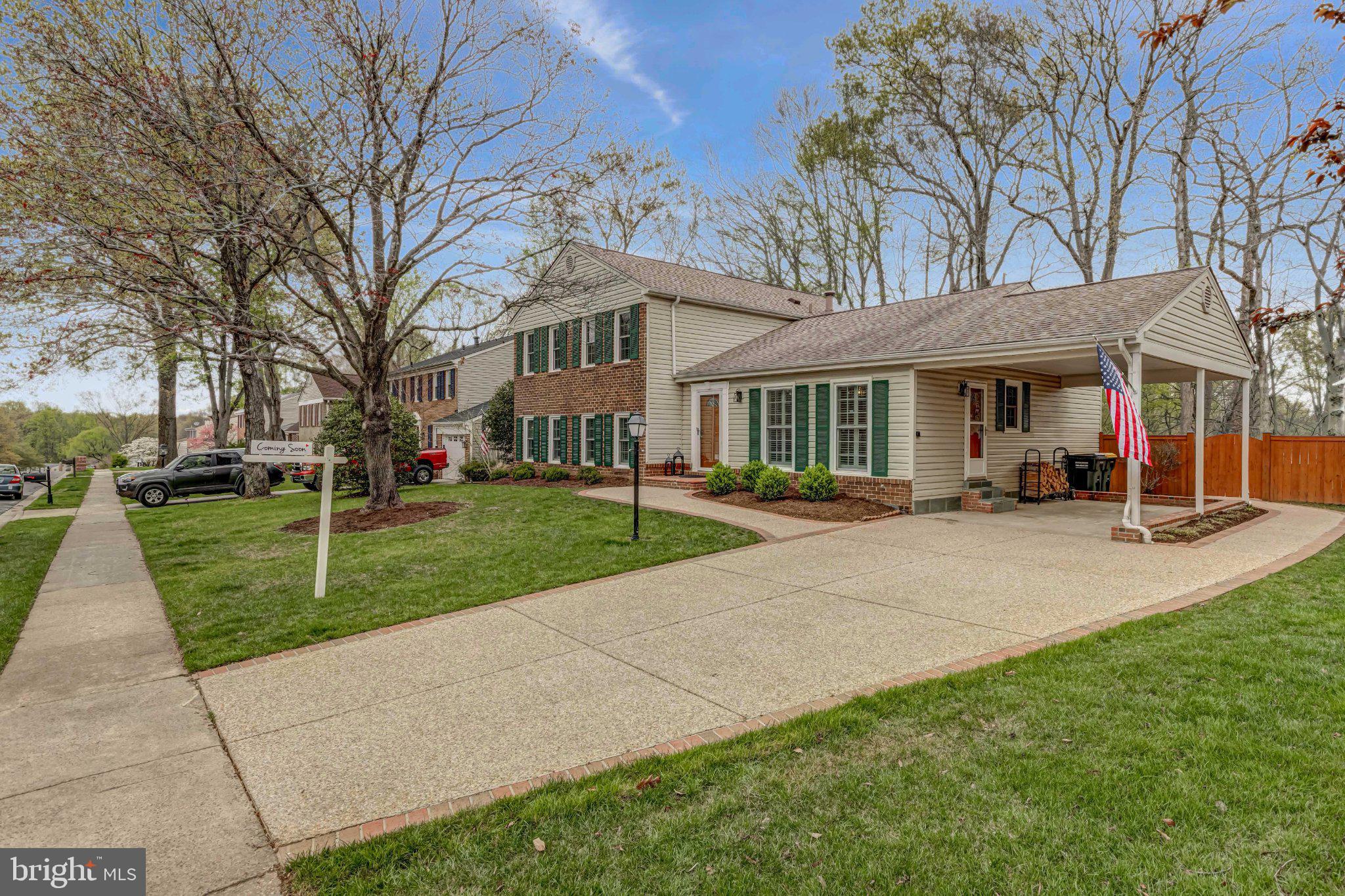 8619 Nanlee Drive Springfield, VA 22152 - Photo 62 of 73 a view of a white house with a big yard and large tree