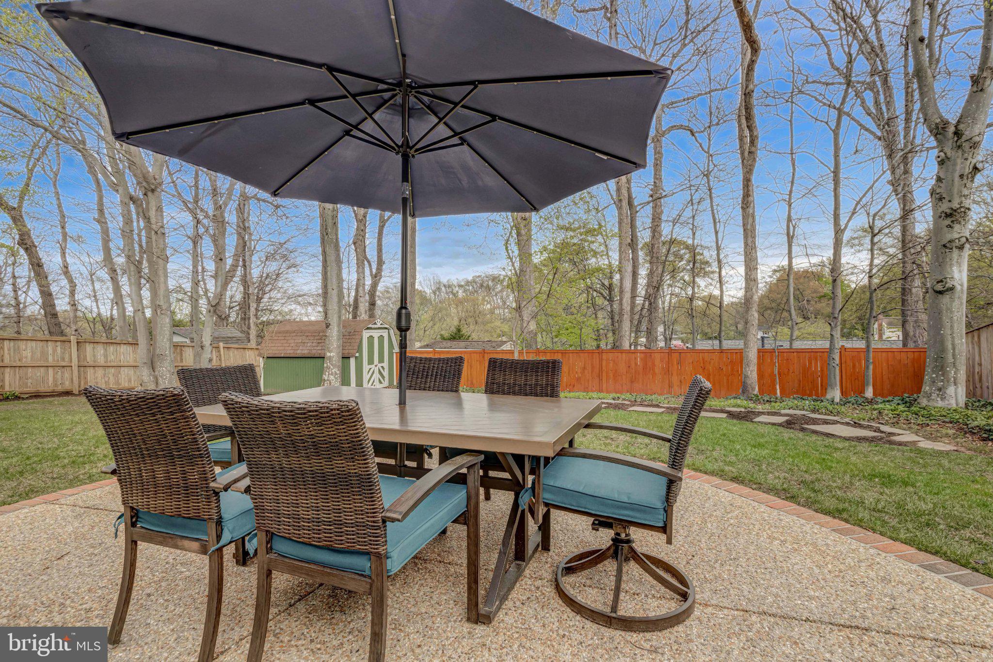 8619 Nanlee Drive Springfield, VA 22152 - Photo 67 of 73 a view of a chair and table in the garden