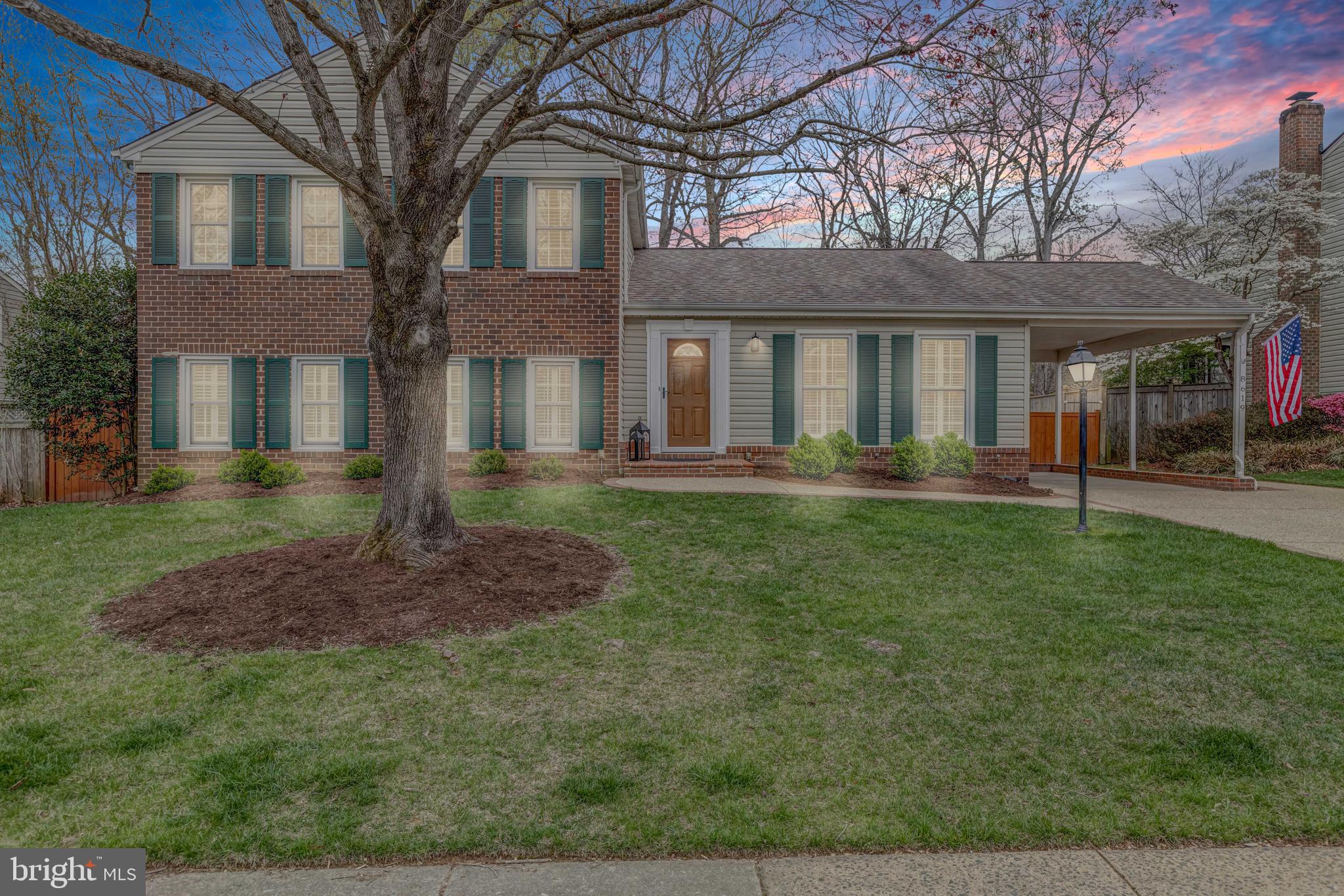 8619 Nanlee Drive Springfield, VA 22152 - Photo 73 of 73 a front view of a house with a yard