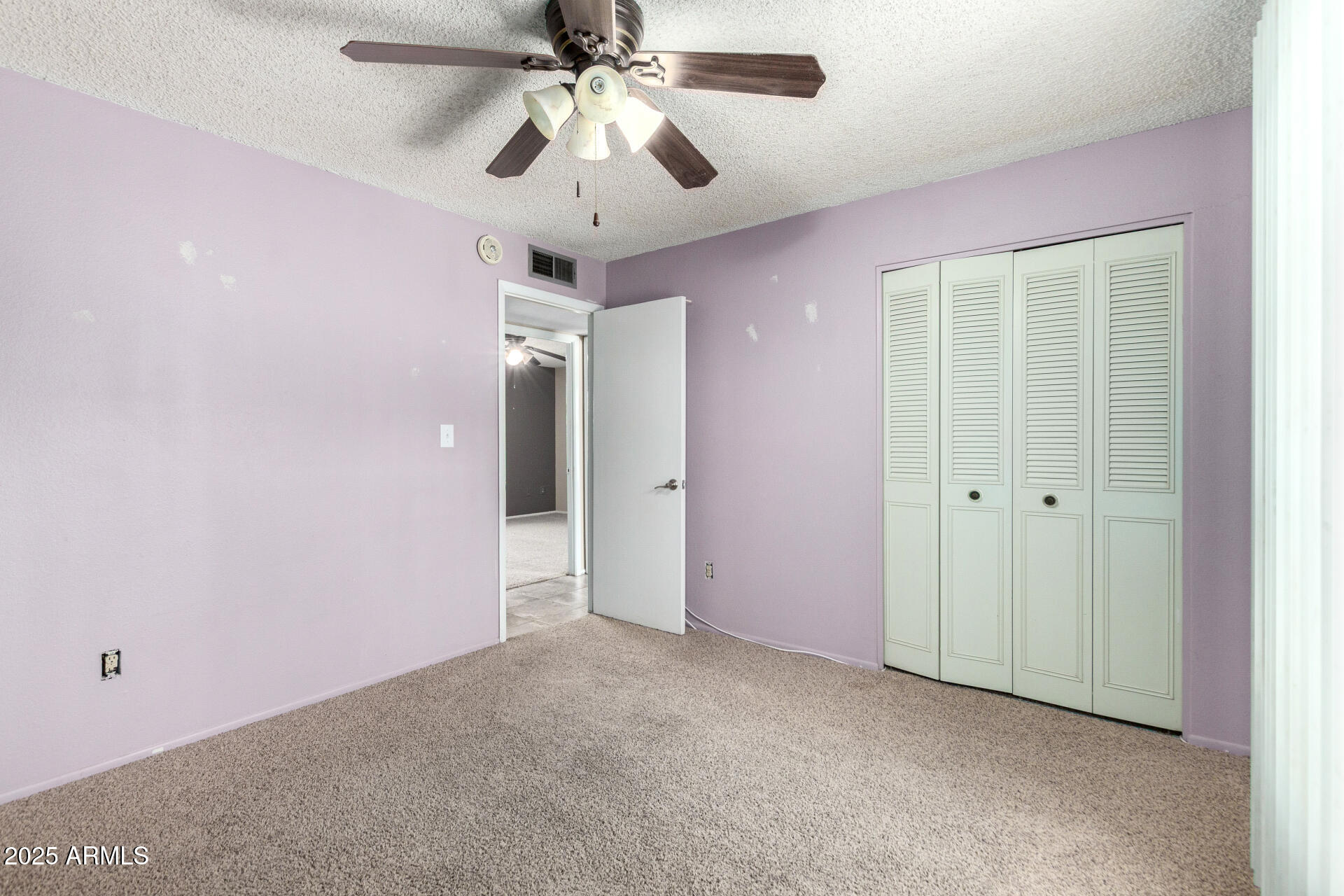 4740 West Bloomfield Road Glendale, AZ 85304 - Photo 22 of 34 en view interior of a room with a ceiling fan and a chandelier fan