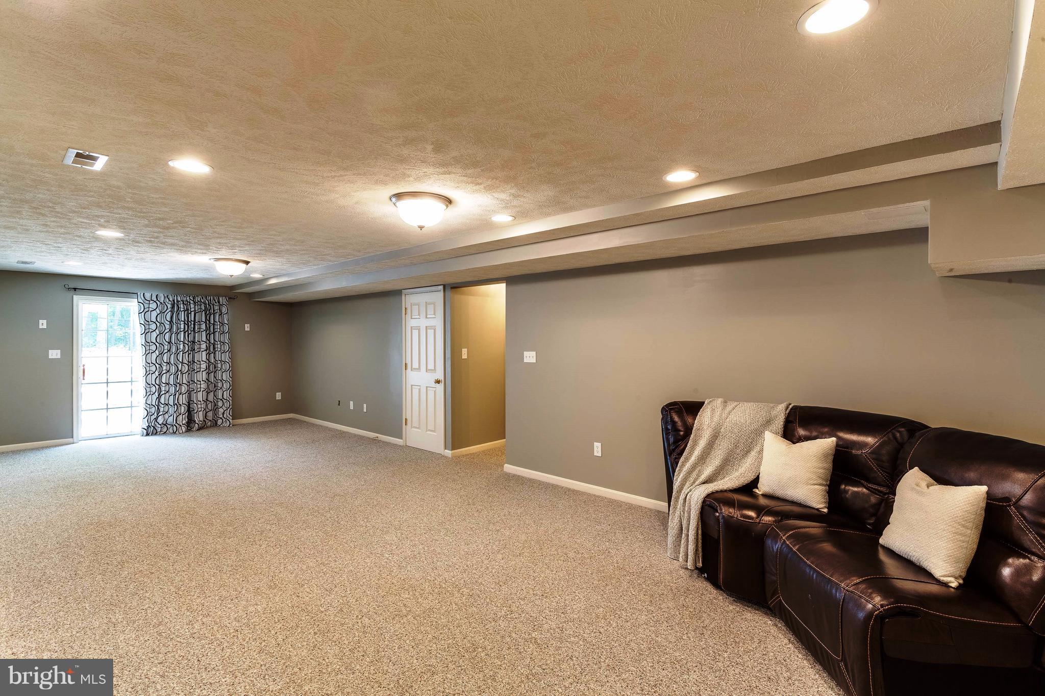 11037 Post Oak Road Spotsylvania, VA 22551 - Photo 26 of 30 Basement Family Room