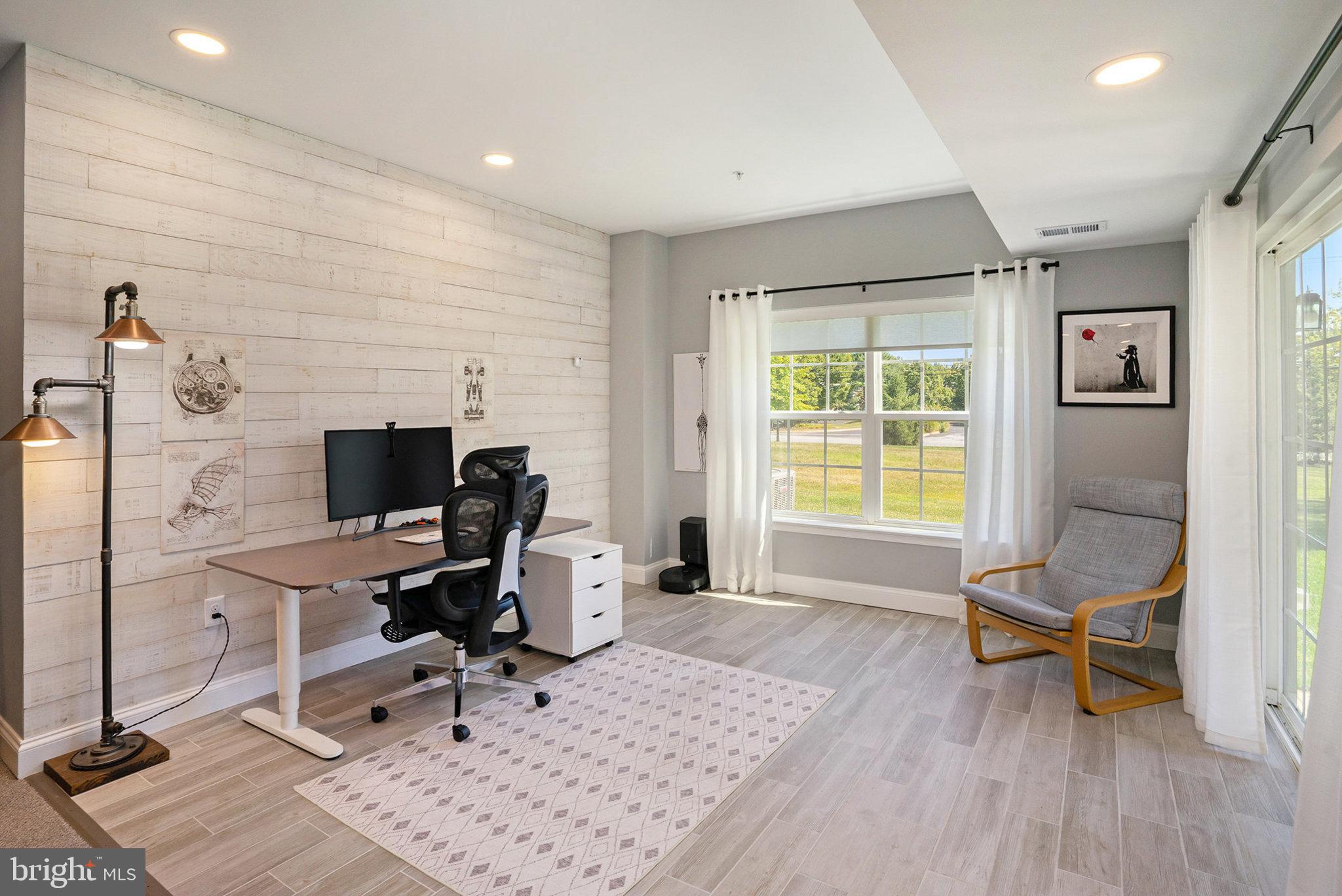 421 Lee Place Exton, PA 19341 - Photo 15 of 58 a view of a workspace with furniture and a window