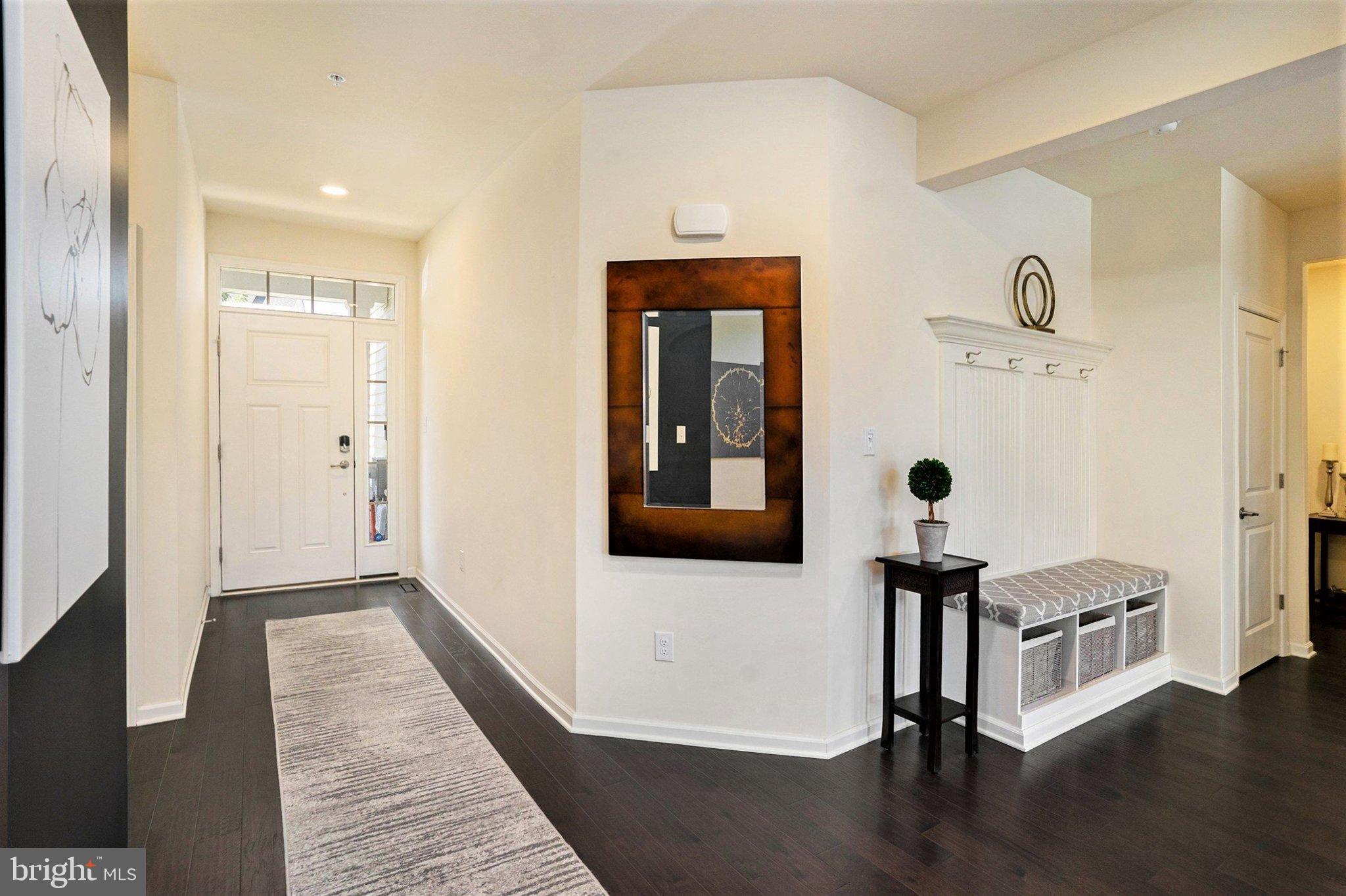 421 Lee Place Exton, PA 19341 - Photo 24 of 58 a view of a hallway with wooden floor and entryway
