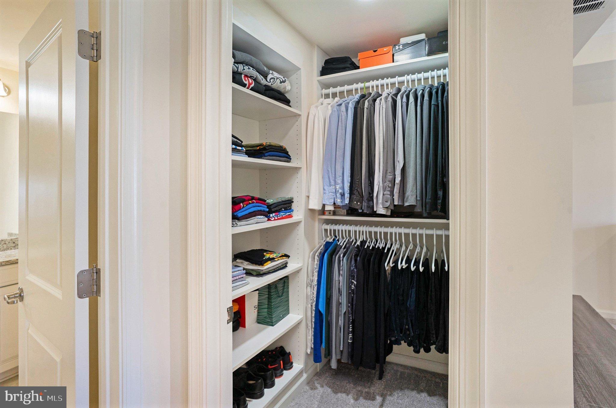 421 Lee Place Exton, PA 19341 - Photo 34 of 58 a view of walk in closet with clothes and shoes