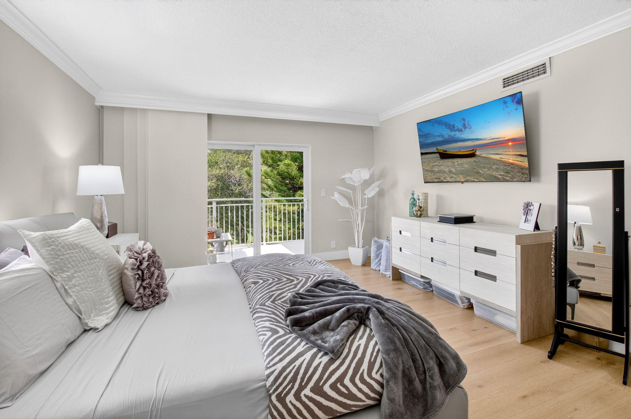 950 De Soto Road, Unit 5A Boca Raton, FL 33432 - Photo 56 of 98 a bedroom with a bed and a window