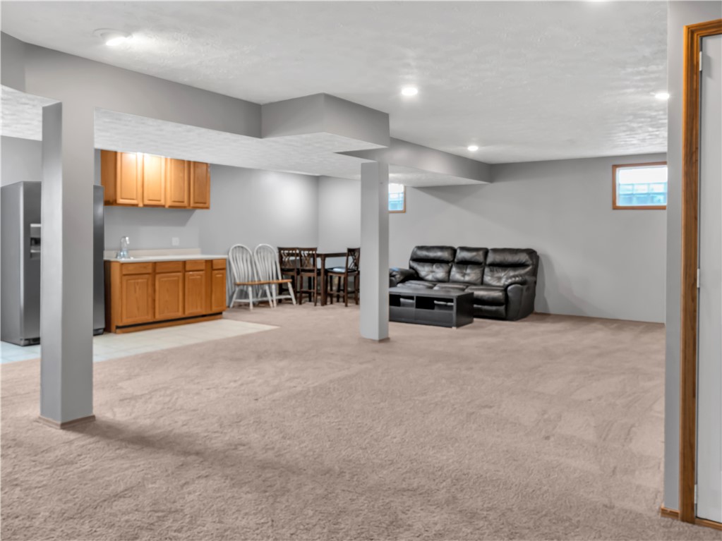 25 Callaway Springboro, OH 45066 - Photo 36 of 51 This expansive recreation room offers ample space for various activities and entertaining guests.