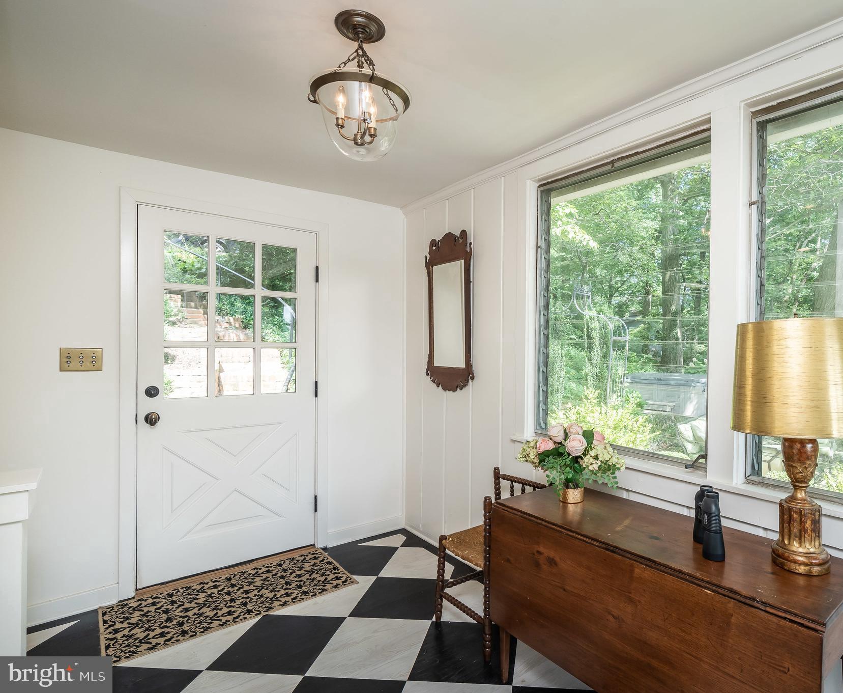 Hand painted wood floors in foyer;
