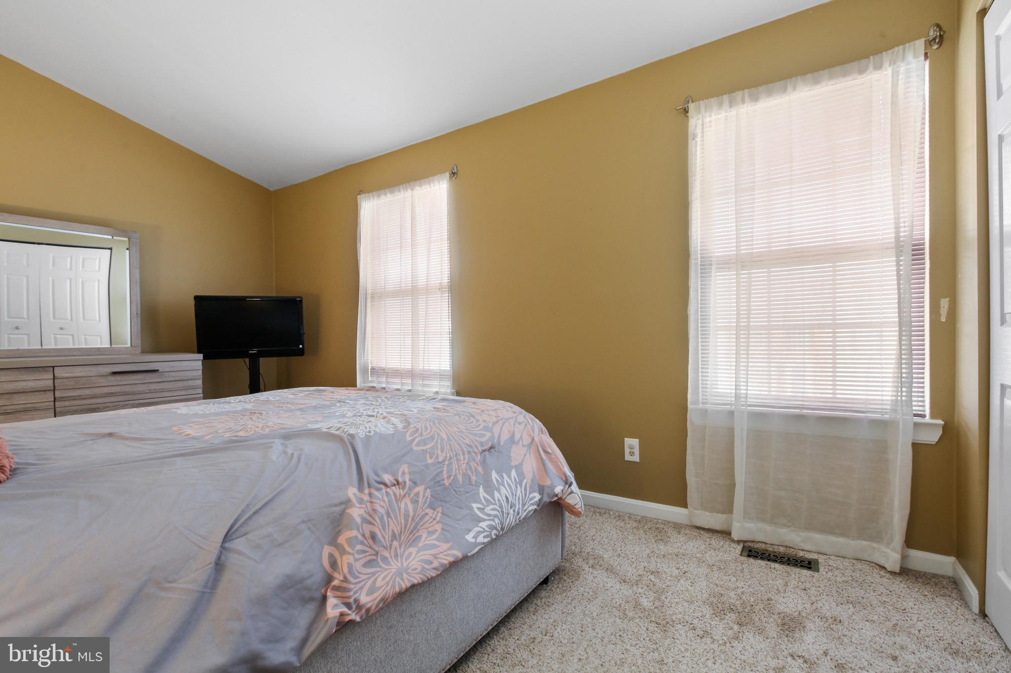 15 Tameron Place Rosedale, MD 21237 - Photo 16 of 38 a bedroom with a bed and a window
