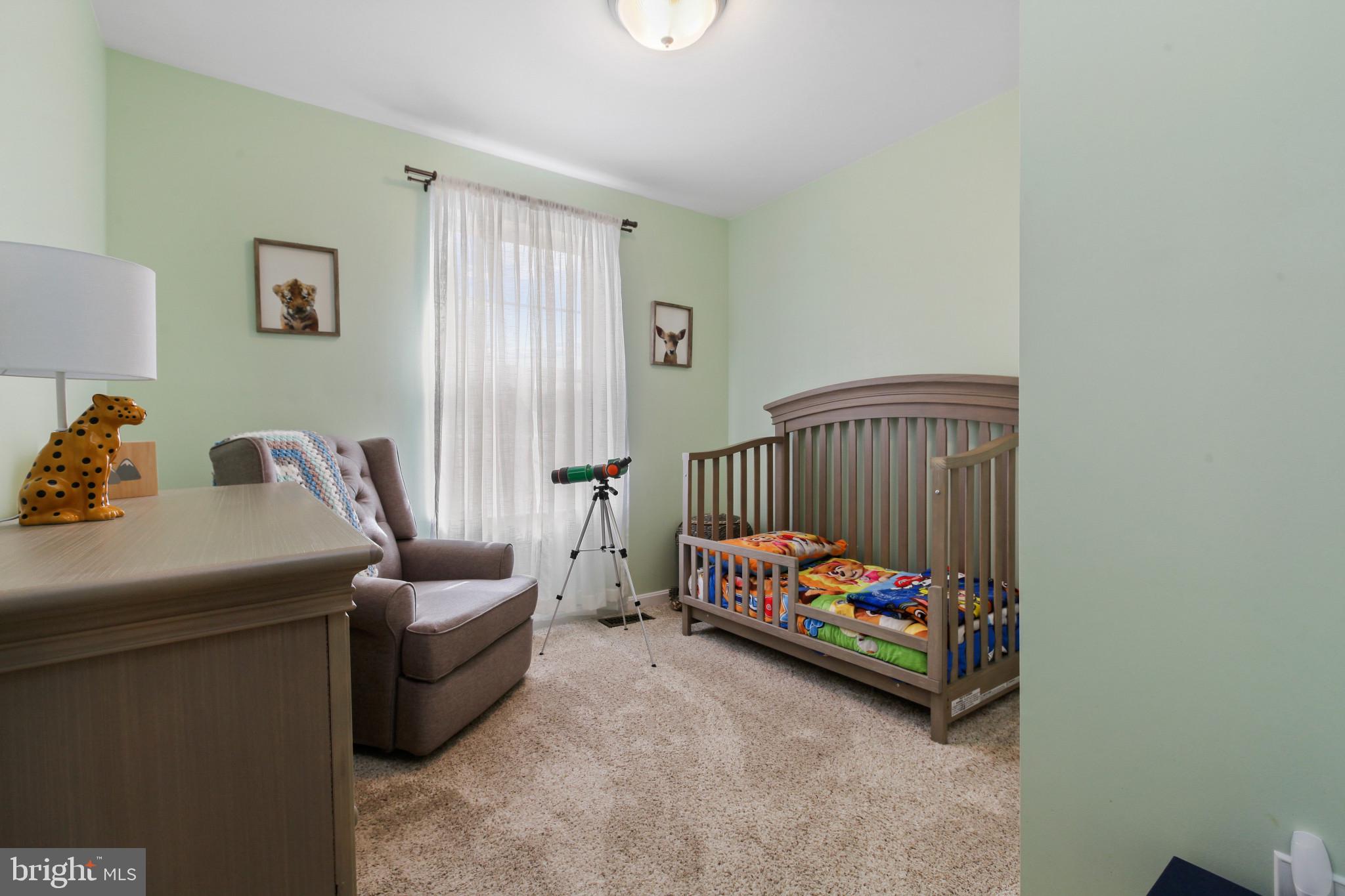 15 Tameron Place Rosedale, MD 21237 - Photo 20 of 38 a bedroom with furniture and a couch