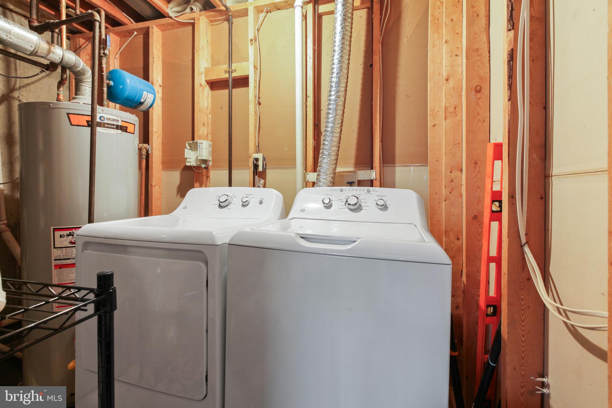 15 Tameron Place Rosedale, MD 21237 - Photo 28 of 38 a utility room with dryer and washer