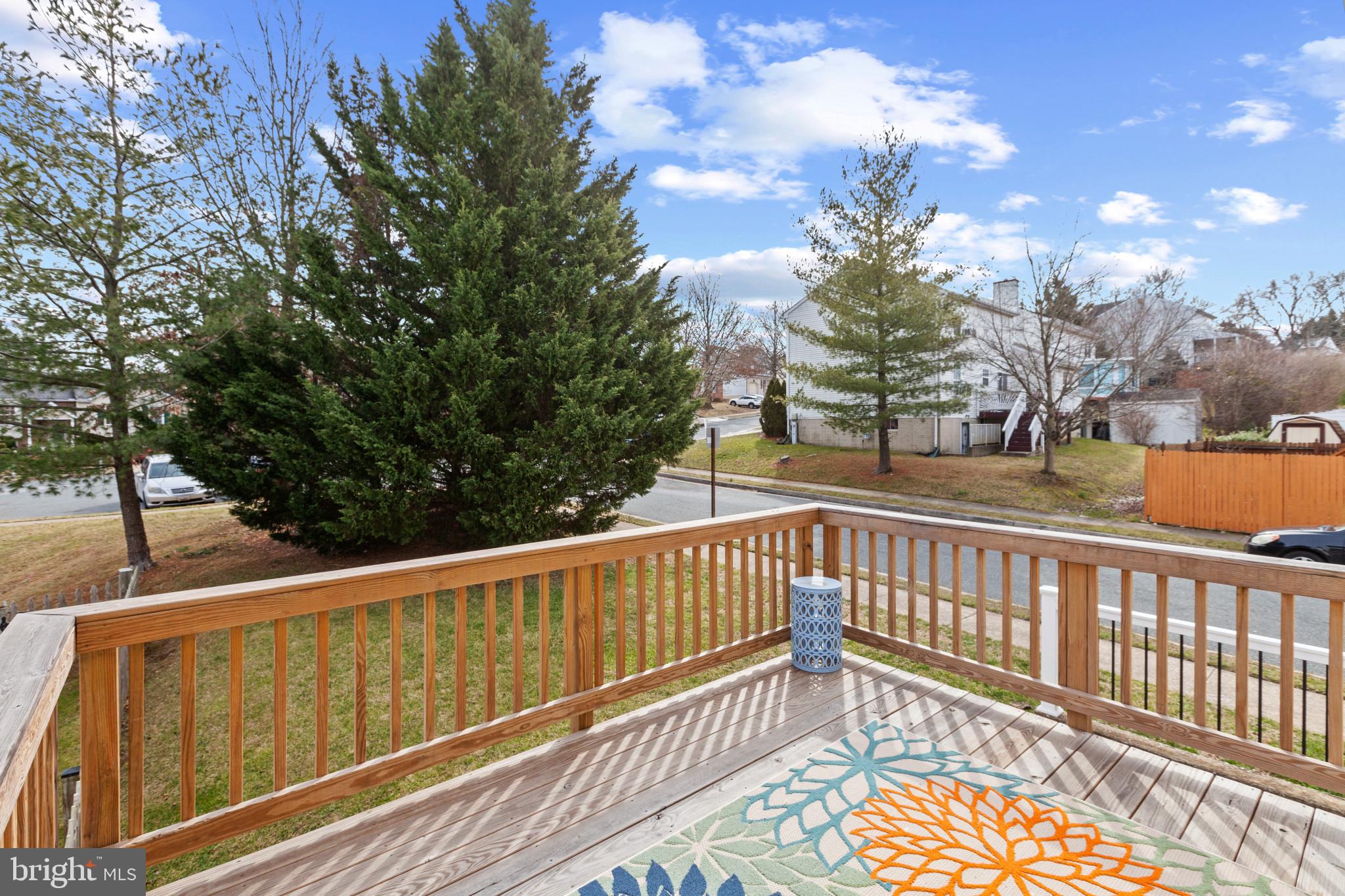 15 Tameron Place Rosedale, MD 21237 - Photo 29 of 38 a view of a balcony with wooden floor and fence