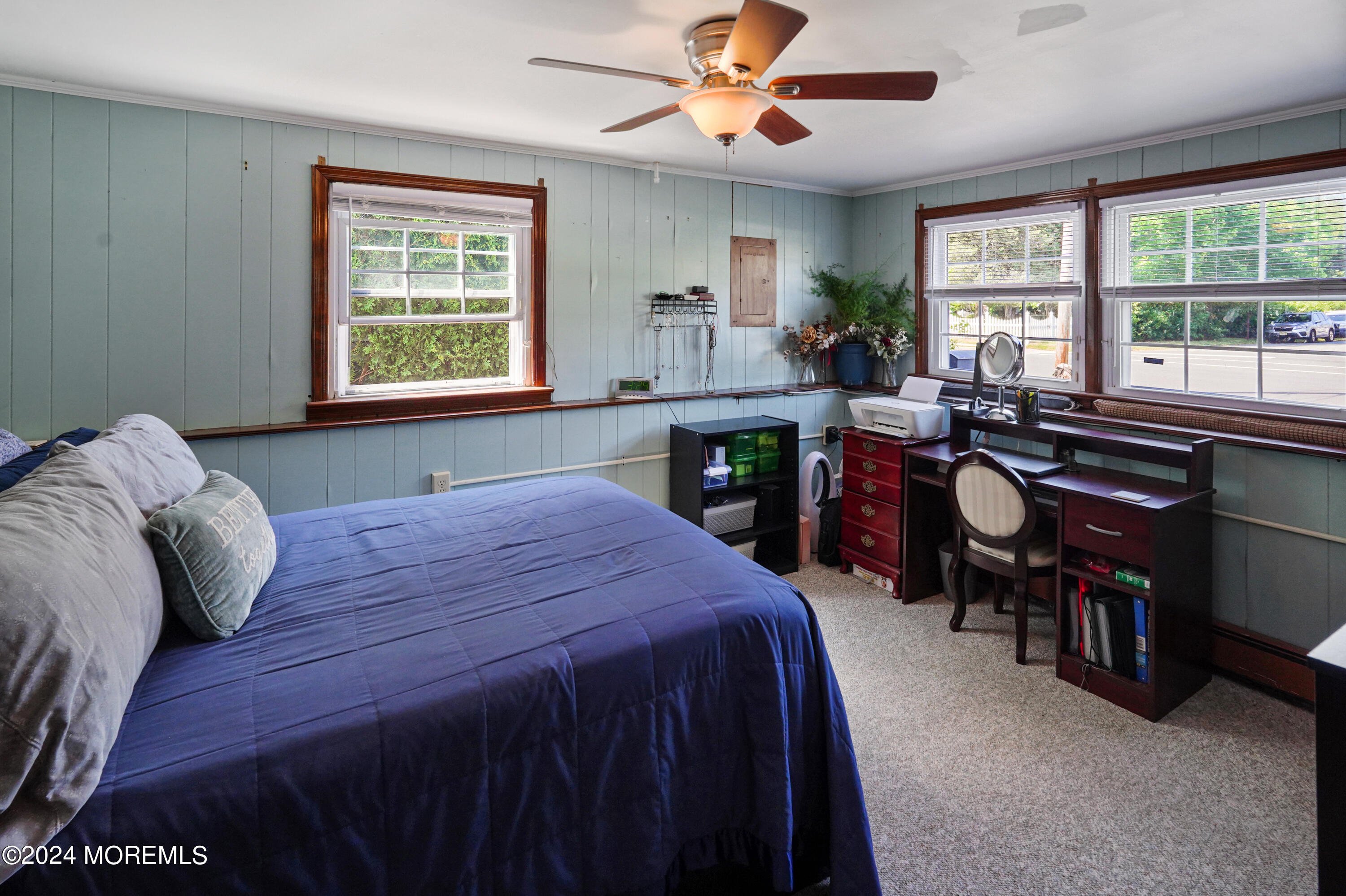 403 Union Lane Brielle, NJ 08730 - Photo 30 of 31 a bedroom with a bed and a table in it