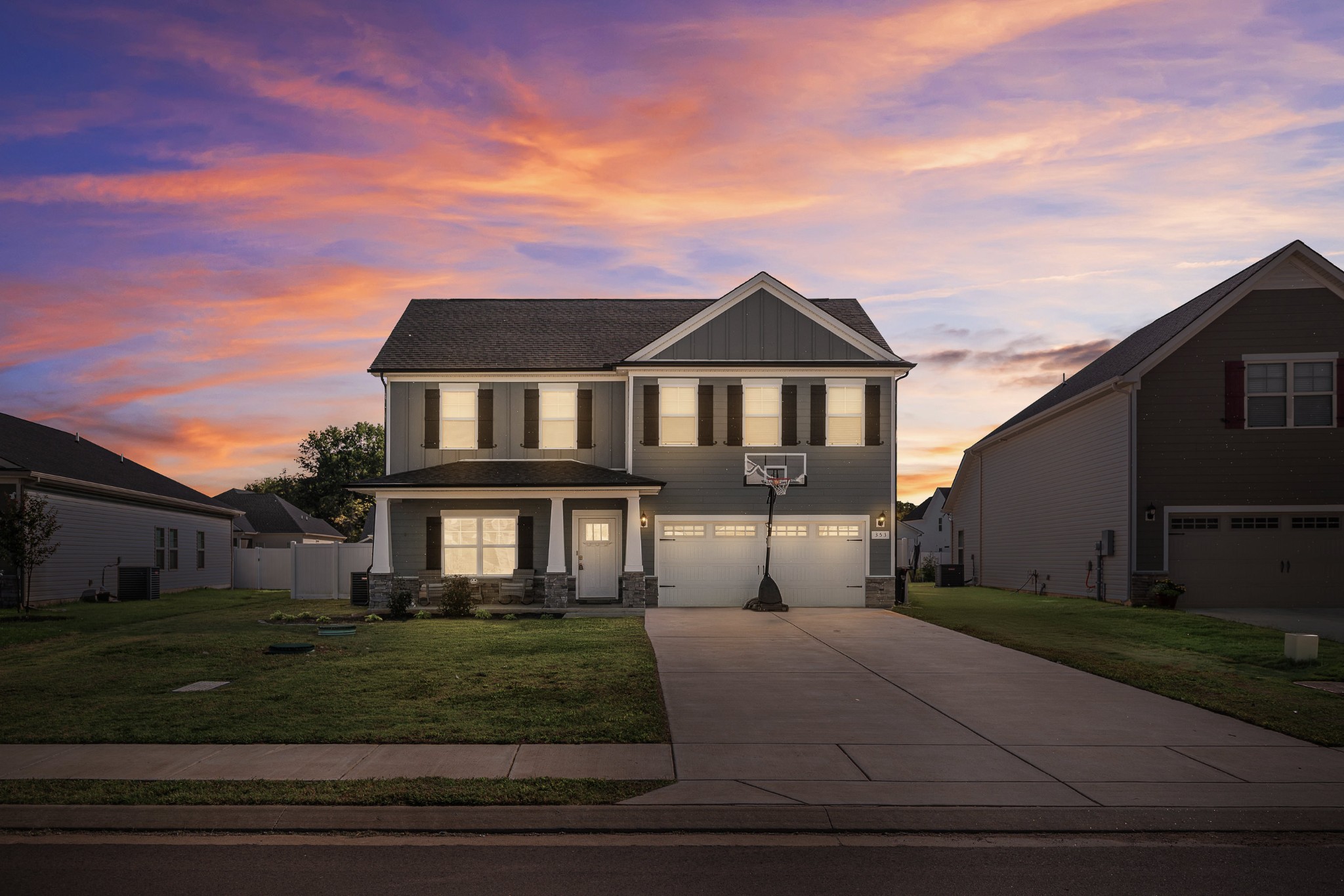 a front view of a house with a yard