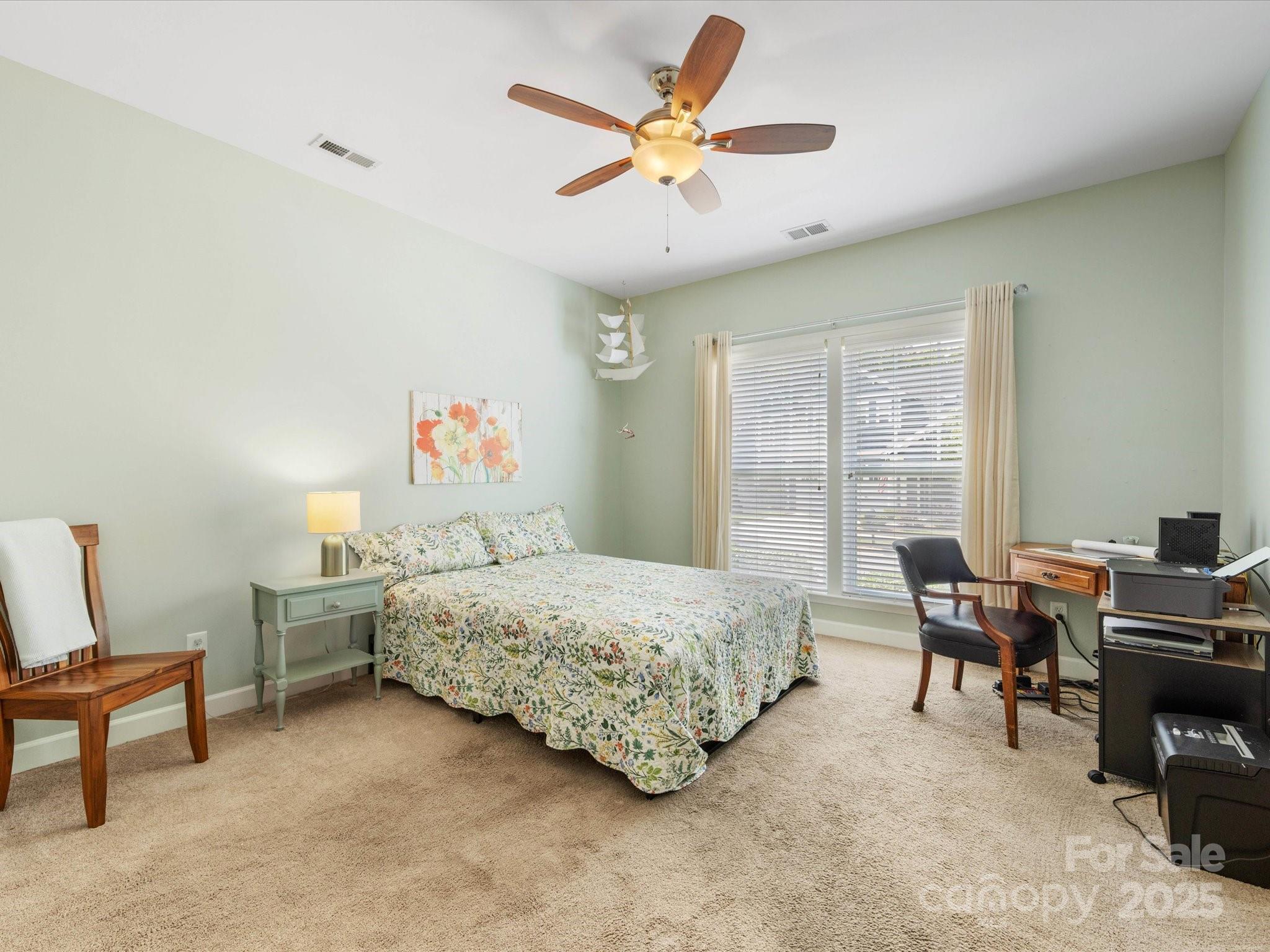 4434 Patriots Hill Road Mint Hill, NC 28227 - Photo 17 of 31 a bedroom with furniture and a large window