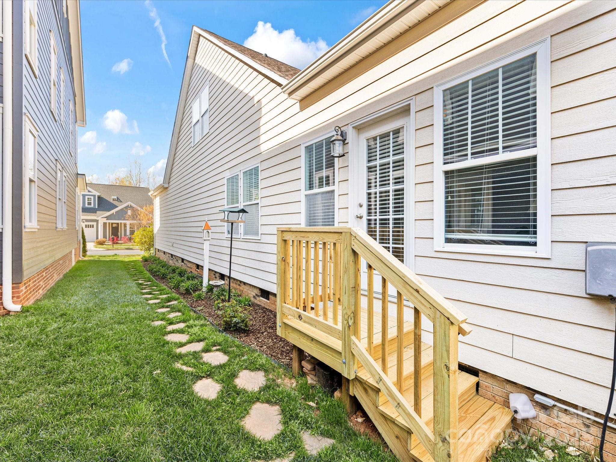 4434 Patriots Hill Road Mint Hill, NC 28227 - Photo 25 of 31 a view of a house with a balcony