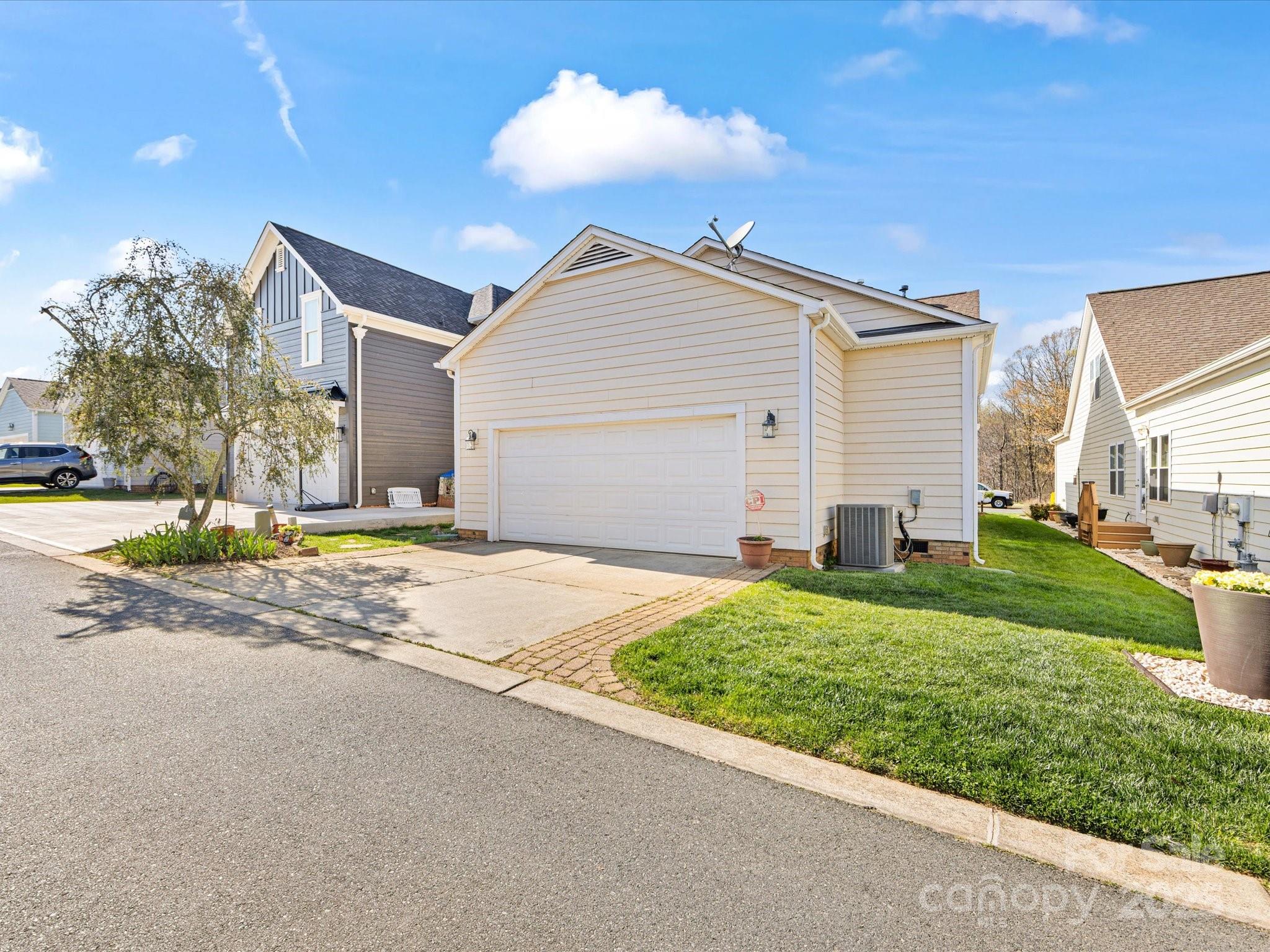4434 Patriots Hill Road Mint Hill, NC 28227 - Photo 26 of 31 a view of a house with a yard and garage