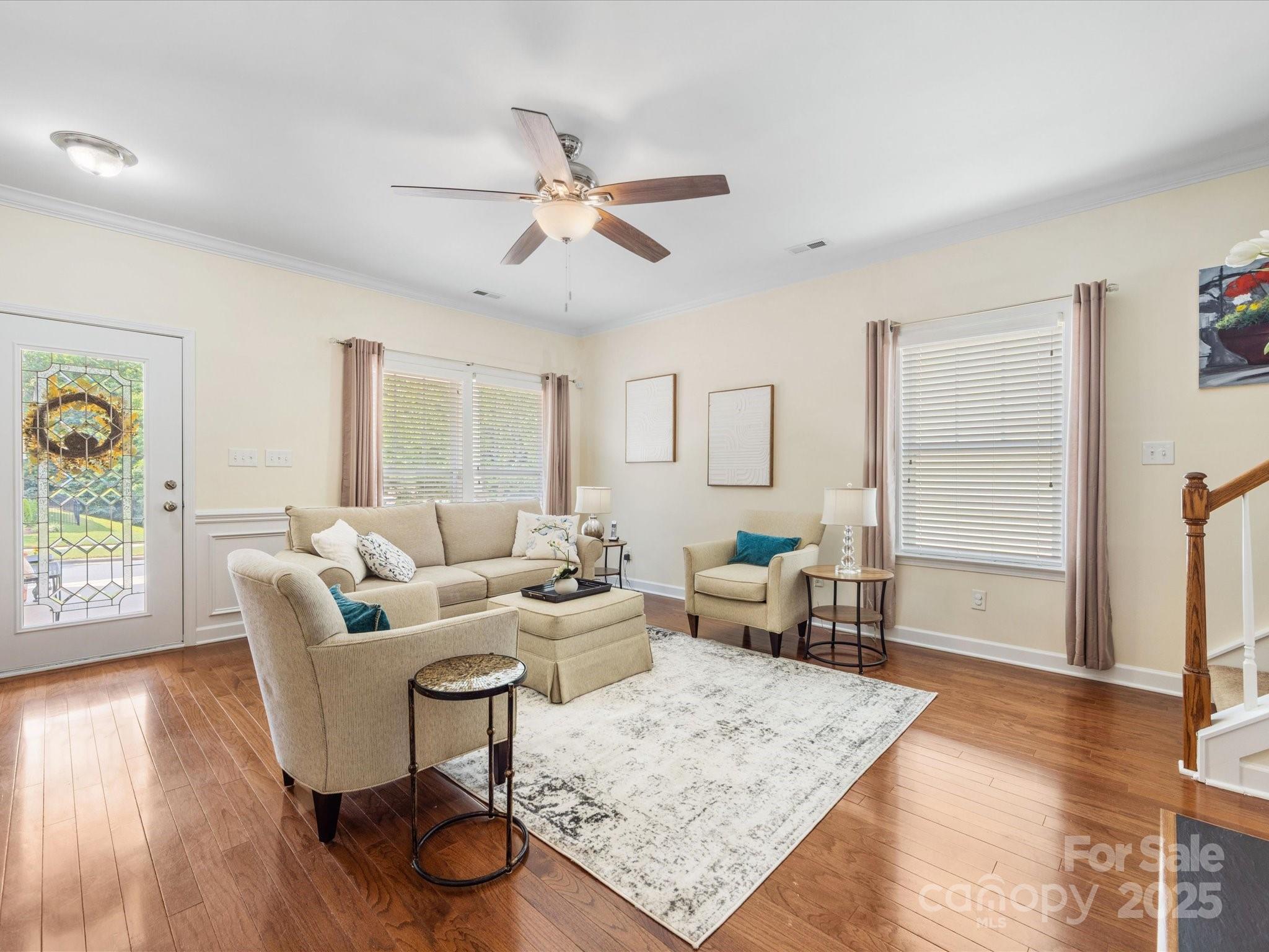 4434 Patriots Hill Road Mint Hill, NC 28227 - Photo 3 of 31 a living room with furniture and a wooden floor