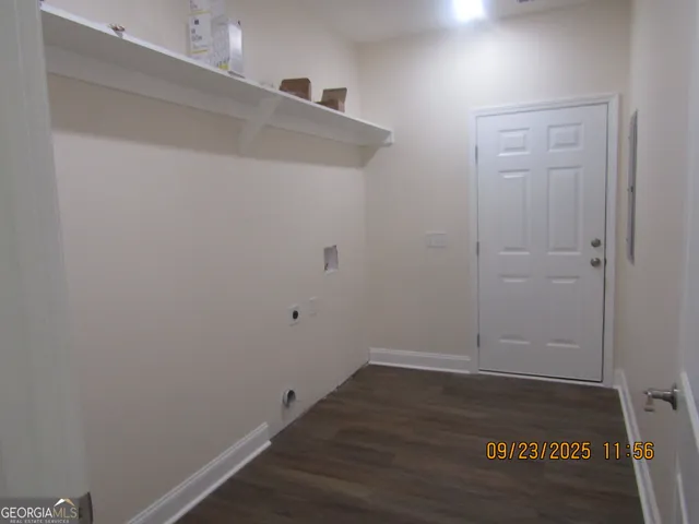 a view of small space with wooden floor