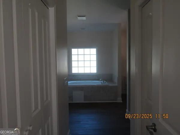 a bathroom with a sink and a bathtub