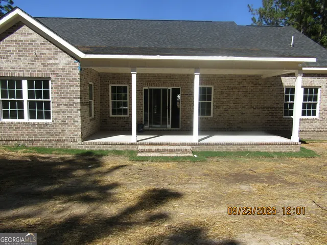 a view of a house with a swimming pool